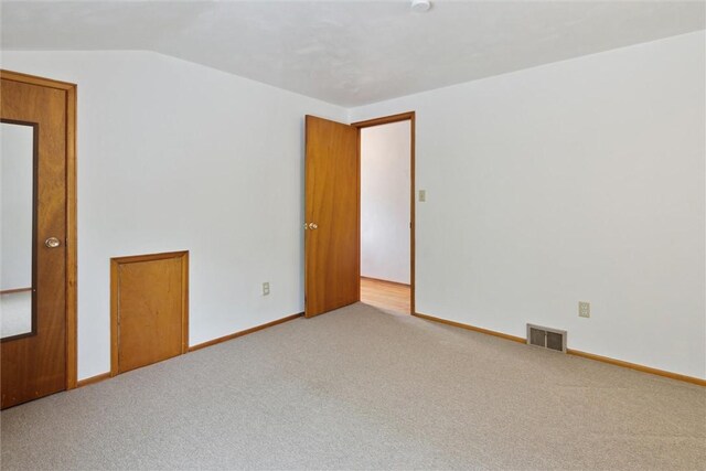 1777 Oblock Rd, Plum Boro, PA 15239 - unfurnished room featuring vaulted ceiling, carpet, and baseboards