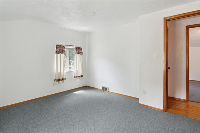 1777 Oblock Rd, Plum Boro, PA 15239 - unfurnished room featuring carpet floors, baseboards, and vaulted ceiling