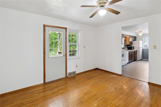 1777 Oblock Rd, Plum Boro, PA 15239 - spare room with plenty of natural light, a ceiling fan, and light wood-style flooring