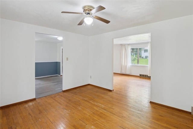 1777 Oblock Rd, Plum Boro, PA 15239 - empty room with light wood-style floors, a ceiling fan, and baseboards