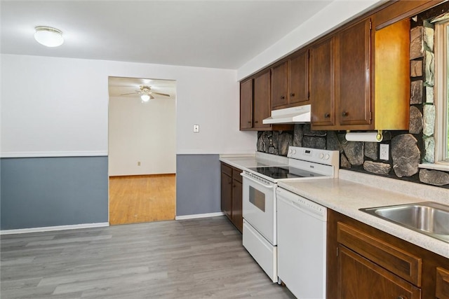 1777 Oblock Rd, Plum Boro, PA 15239 - kitchen featuring under cabinet range hood, white appliances, light countertops, backsplash, and a ceiling fan