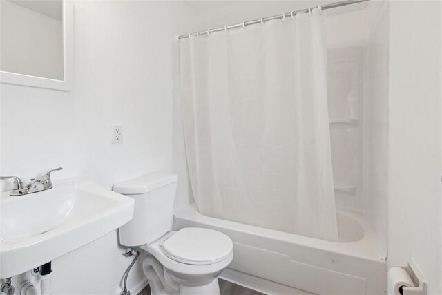 1777 Oblock Rd, Plum Boro, PA 15239 - full bathroom with toilet, shower / bath combo with shower curtain, and a sink