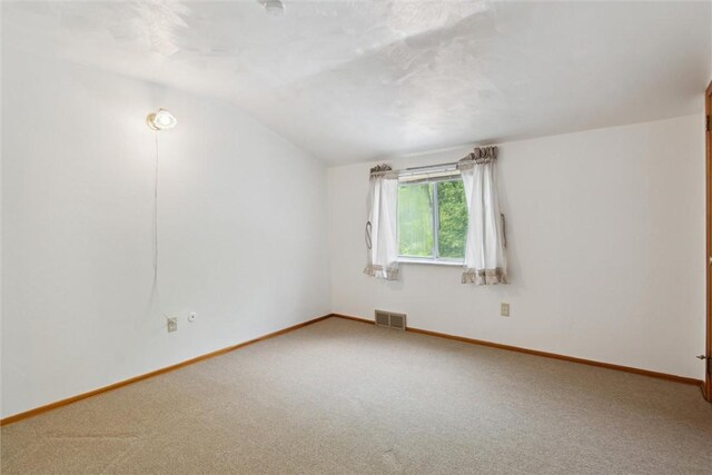 1777 Oblock Rd, Plum Boro, PA 15239 - unfurnished room with vaulted ceiling, carpet, and baseboards