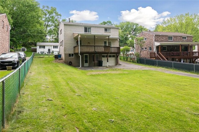 1777 Oblock Rd, Plum Boro, PA 15239 - back of house featuring a garage, a deck, and driveway