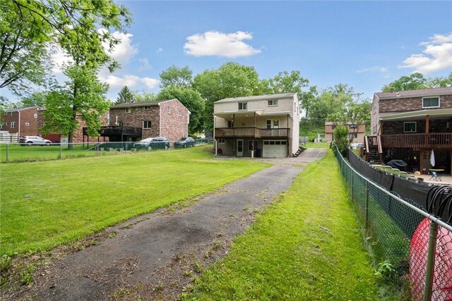 1777 Oblock Rd, Plum Boro, PA 15239 - view of yard featuring an attached garage and driveway