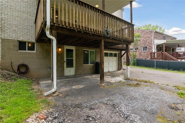 1777 Oblock Rd, Plum Boro, PA 15239 - view of patio / terrace featuring an attached garage, asphalt driveway, and a wooden deck