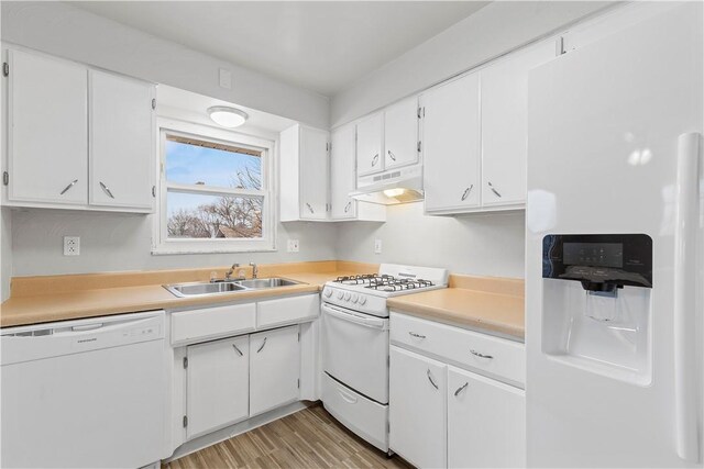 257 Noble Ave, Crafton, PA 15205 - kitchen with white appliances, a sink, under cabinet range hood, white cabinets, and light countertops