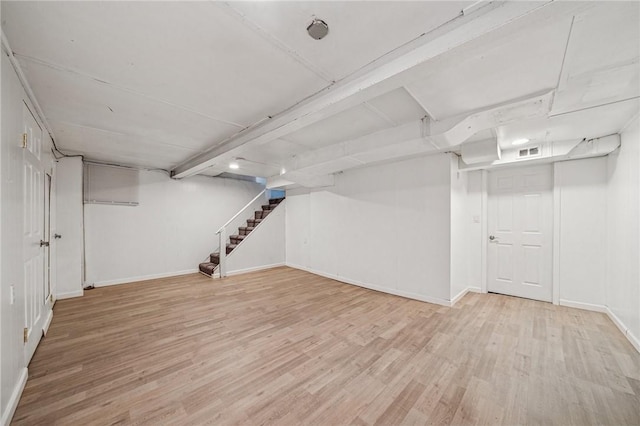 1422 Meadow St, Mckeesport, PA 15132 - finished basement with wood finished floors, baseboards, and stairs