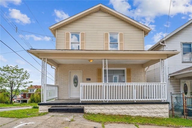 1422 Meadow St, Mckeesport, PA 15132 - view of front of home with covered porch and brick siding