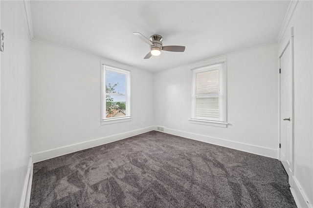1422 Meadow St, Mckeesport, PA 15132 - spare room with dark carpet, ceiling fan, baseboards, and ornamental molding