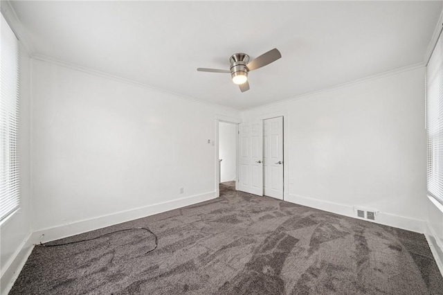 1422 Meadow St, Mckeesport, PA 15132 - unfurnished bedroom with carpet flooring, ornamental molding, baseboards, multiple windows, and a ceiling fan