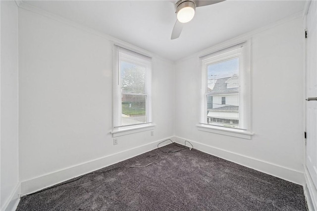 1422 Meadow St, Mckeesport, PA 15132 - unfurnished room featuring dark colored carpet, baseboards, ceiling fan, and crown molding