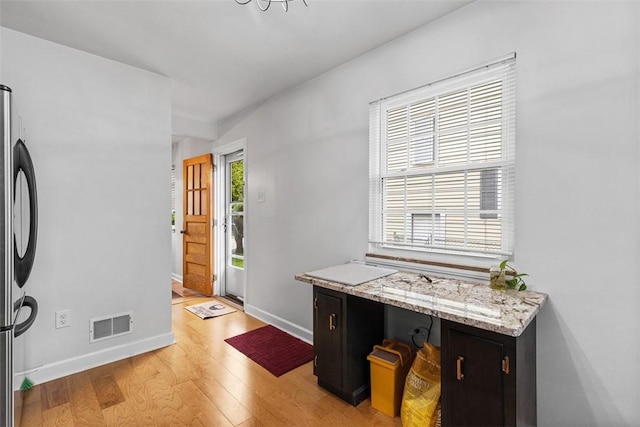 830 W Pike St, Chartiers, PA 15342 - foyer entrance with light wood-style flooring and baseboards