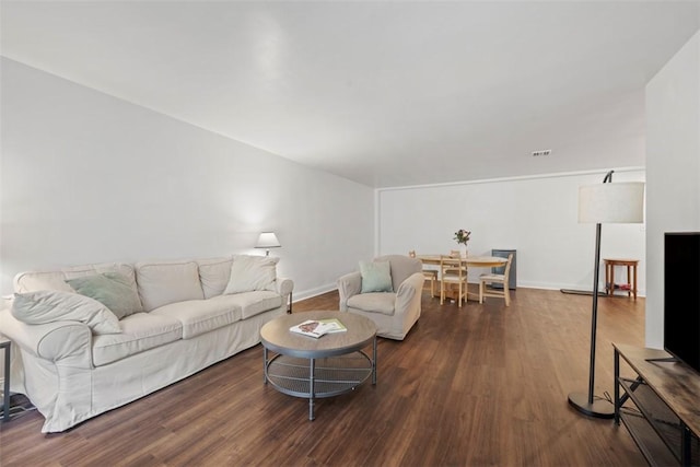 5100 5th Ave Unit 407, Shadyside, PA 15232 - living room with dark wood-style floors and baseboards