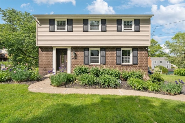 282 Carmell Dr, Upper St Clair, PA 15241 - colonial-style house featuring brick siding and a front lawn