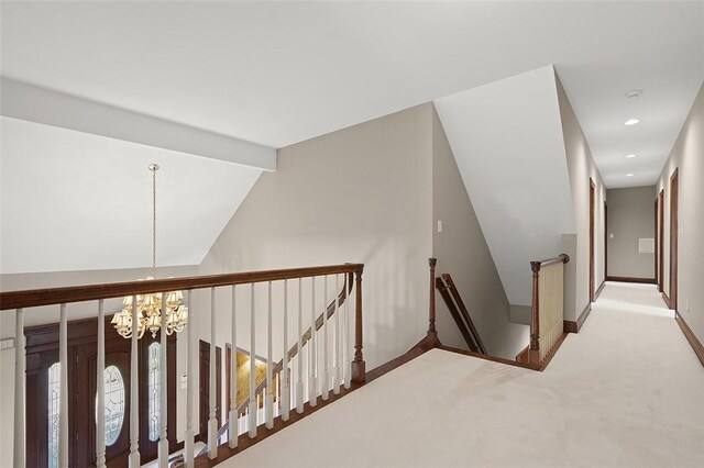 3702 Millstone Ct, Murrysville, PA 15668 - corridor with an upstairs landing, carpet, baseboards, lofted ceiling, and recessed lighting