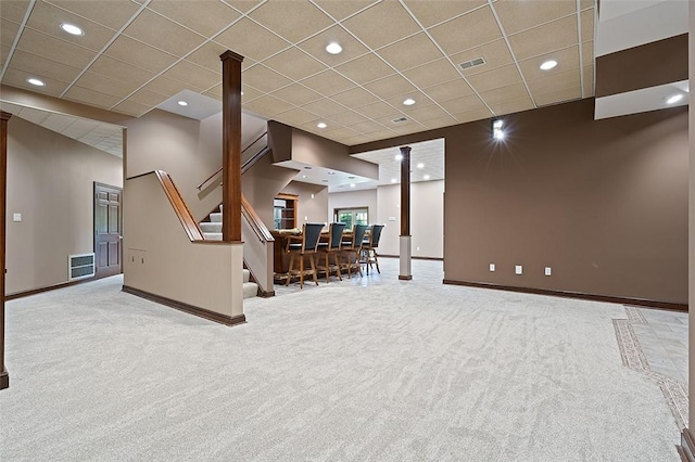3702 Millstone Ct, Murrysville, PA 15668 - below grade area featuring carpet flooring, baseboards, a paneled ceiling, stairway, and recessed lighting