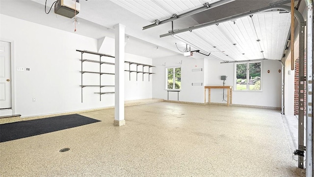 3702 Millstone Ct, Murrysville, PA 15668 - garage with a garage door opener and baseboards