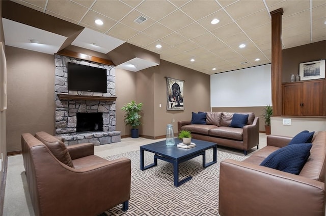 3702 Millstone Ct, Murrysville, PA 15668 - living room featuring baseboards, a fireplace, light colored carpet, and a drop ceiling