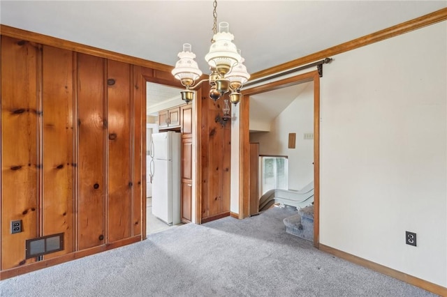 211 Homestead Dr, Middlesex Twp, PA 16059 - unfurnished bedroom featuring freestanding refrigerator, carpet floors, a chandelier, and baseboards