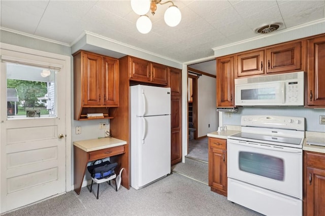 211 Homestead Dr, Middlesex Twp, PA 16059 - kitchen with white appliances, light countertops, crown molding, brown cabinets, and light colored carpet