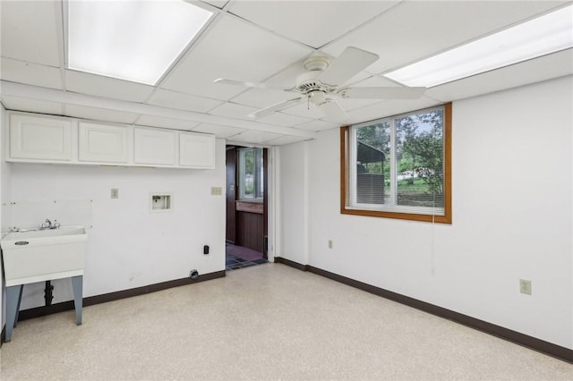 211 Homestead Dr, Middlesex Twp, PA 16059 - below grade area with a ceiling fan, baseboards, and a sink