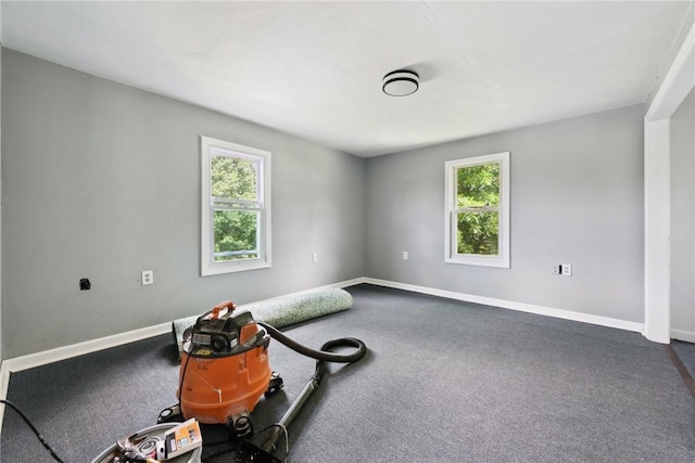 920 W 4th Ave, Derry Twp, PA 15627 - carpeted empty room with healthy amount of natural light and baseboards