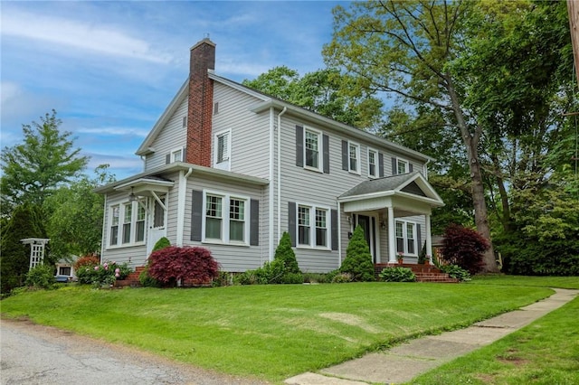 120 S Shenango St, Mercer Boro Mer, PA 16137 - view of front of house featuring a chimney and a front yard