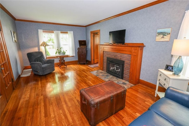 120 S Shenango St, Mercer Boro Mer, PA 16137 - living room featuring wood finished floors, ornamental molding, baseboards, and a brick fireplace