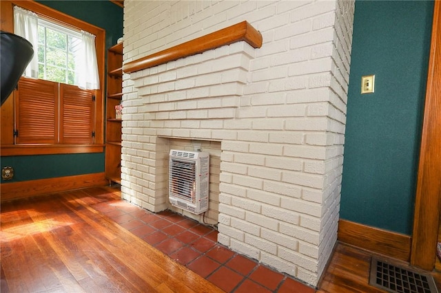 120 S Shenango St, Mercer Boro Mer, PA 16137 - detailed view of heating unit, baseboards, and wood finished floors