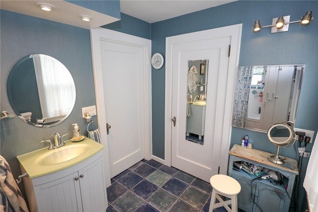 120 S Shenango St, Mercer Boro Mer, PA 16137 - bathroom featuring stone finish floors, vanity, and baseboards