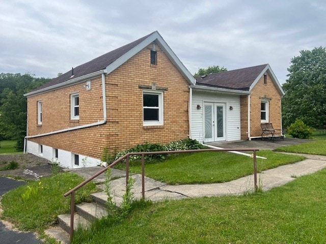 525 Glade Mill Run, Middlesex Twp, PA 16059 - rear view of property featuring french doors, brick siding, and a yard