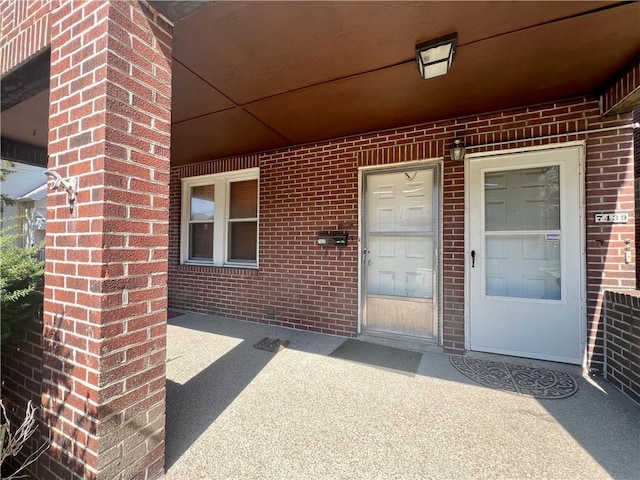 7437-7439 Schoyer Ave, Swissvale, PA 15218 - view of exterior entry featuring brick siding