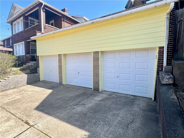 7437-7439 Schoyer Ave, Swissvale, PA 15218 - garage with concrete driveway