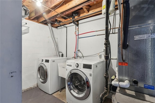 362 Fruitwood Dr, Bethel Park, PA 15102 - laundry room featuring washer and clothes dryer, concrete block wall, and heating unit