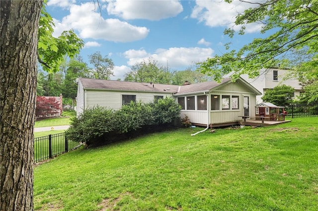 362 Fruitwood Dr, Bethel Park, PA 15102 - back of house featuring a deck, a sunroom, and a chimney