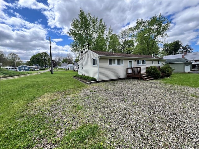 11859 Kammerer Ave, Conneaut Lake Cra, PA 16316 - view of front of house with a front lawn and a wooden deck