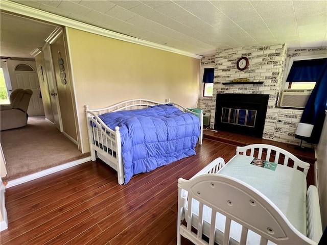 11859 Kammerer Ave, Conneaut Lake Cra, PA 16316 - bedroom featuring ornamental molding, a brick fireplace, wood finished floors, and cooling unit