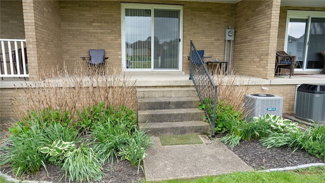 4895 Lucerne Rd, White Twp Ind, PA 15701 - entrance to property featuring central air condition unit and brick siding