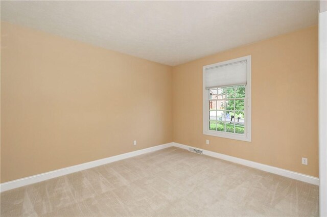 2214 Shannon Mills Dr, Connoquenessing Twp, PA 16053 - unfurnished room featuring baseboards and light colored carpet