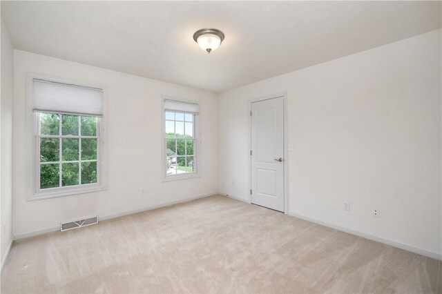 2214 Shannon Mills Dr, Connoquenessing Twp, PA 16053 - empty room with light carpet and baseboards