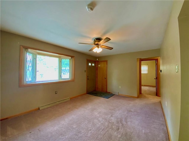 403 Virginia Ave, Harmony Twp Bea, PA 15003 - carpeted spare room featuring a baseboard radiator, ceiling fan, baseboards, and a smoke detector