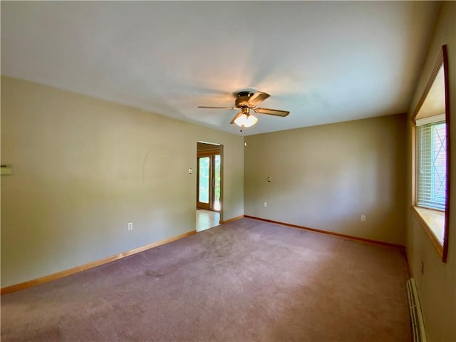 403 Virginia Ave, Harmony Twp Bea, PA 15003 - unfurnished room featuring a baseboard radiator, ceiling fan, carpet floors, and baseboards