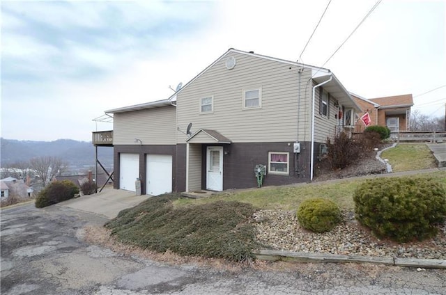 403 Virginia Ave, Harmony Twp Bea, PA 15003 - view of side of home featuring an attached garage and driveway