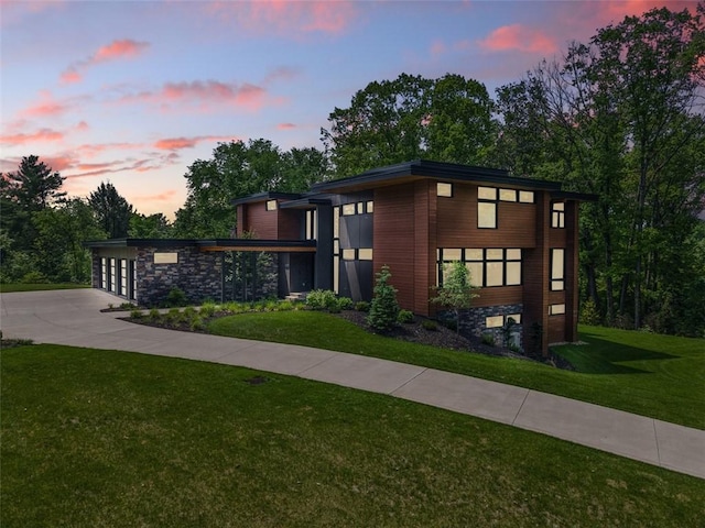 409 Fox Chapel Rd, Fox Chapel, PA 15238 - view of front of home featuring a lawn, stone siding, and driveway