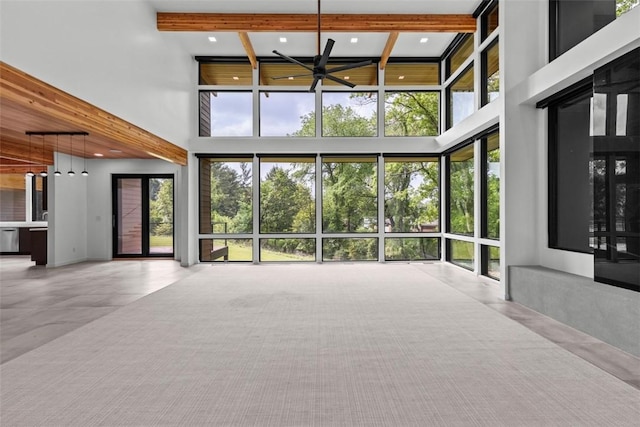 409 Fox Chapel Rd, Fox Chapel, PA 15238 - unfurnished living room featuring a high ceiling, ceiling fan, recessed lighting, and beam ceiling