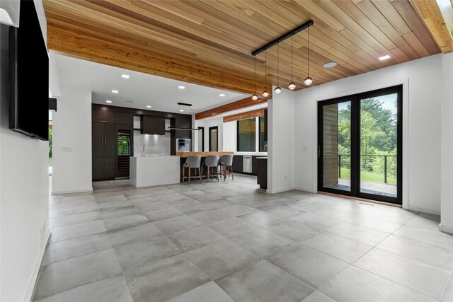 409 Fox Chapel Rd, Fox Chapel, PA 15238 - living area with baseboards, wooden ceiling, and recessed lighting