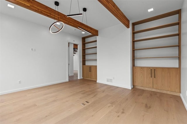409 Fox Chapel Rd, Fox Chapel, PA 15238 - spare room featuring light wood-type flooring, beamed ceiling, and baseboards