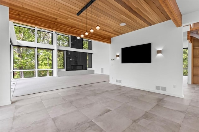409 Fox Chapel Rd, Fox Chapel, PA 15238 - unfurnished living room with wooden ceiling with exposed beams