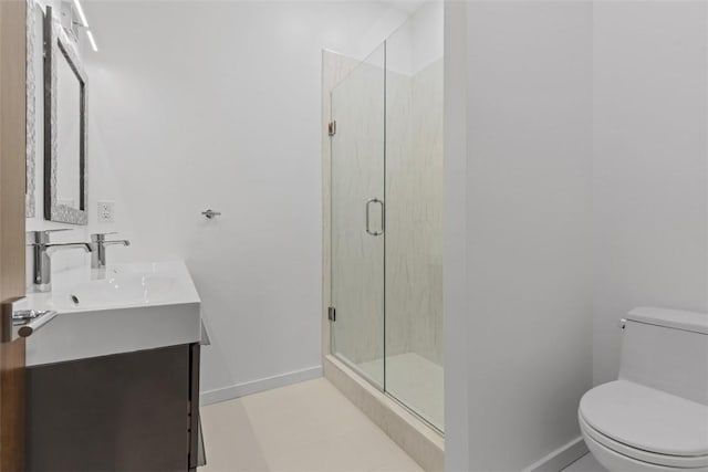 409 Fox Chapel Rd, Fox Chapel, PA 15238 - bathroom with baseboards, toilet, a shower stall, and vanity